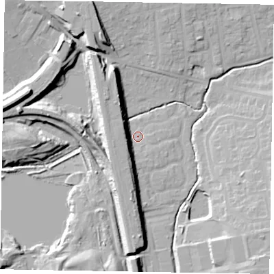 Shaded relief map of the ground around MK23AR, computed from Environment Agency LiDAR. The ground here sits at about 72 m above sea level and falls 20 m across the surrounding 800 m. Surface water reaching this point runs off ground lying to the south-south-west, 10.9 m higher.