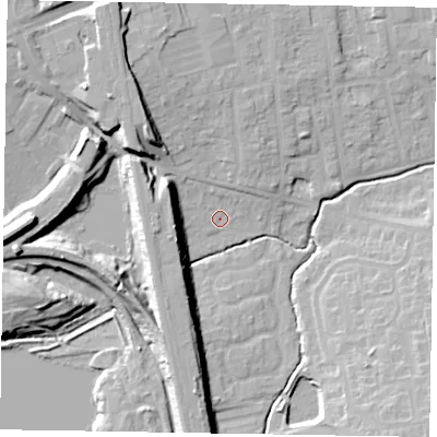 Shaded relief map of the ground around MK23AW, computed from Environment Agency LiDAR. The ground here sits at about 71 m above sea level and falls 20 m across the surrounding 800 m. Surface water reaching this point runs off ground lying to the west, 16.5 m higher.