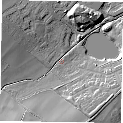 Shaded relief map of the ground around MK35FT, computed from Environment Agency LiDAR. The ground here sits at about 85 m above sea level and falls 19 m across the surrounding 800 m. Surface water reaching this point runs off ground lying to the west-north-west, 14.5 m higher.