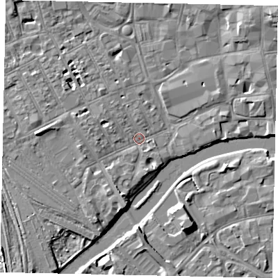Shaded relief map of the ground around MK401RB, computed from Environment Agency LiDAR. The ground here sits at about 26 m above sea level and falls 7 m across the surrounding 800 m. Surface water reaching this point runs off ground lying to the west, 4.6 m higher.