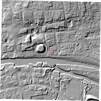 Shaded relief map of the ground around MK403NZ, computed from Environment Agency LiDAR. The ground here sits at about 27 m above sea level and falls 10 m across the surrounding 800 m. Surface water reaching this point runs off ground lying to the north-north-west, 7.7 m higher.
