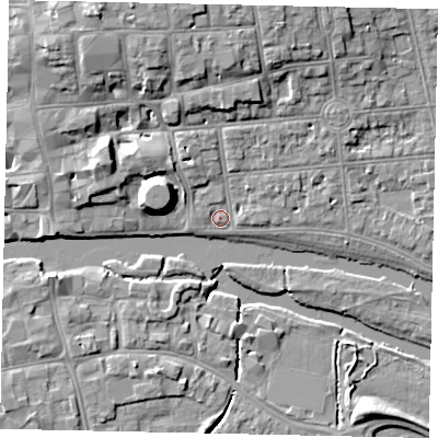 Shaded relief map of the ground around MK403PA, computed from Environment Agency LiDAR. The ground here sits at about 27 m above sea level and falls 10 m across the surrounding 800 m. Surface water reaching this point runs off ground lying to the north, 7.2 m higher.