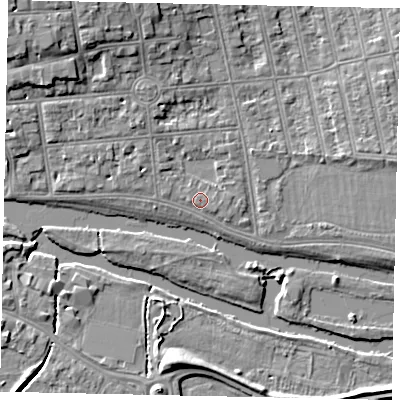 Shaded relief map of the ground around MK403PE, computed from Environment Agency LiDAR. The ground here sits at about 27 m above sea level and falls 9 m across the surrounding 800 m. Surface water reaching this point runs off ground lying to the north-west, 1.3 m higher.