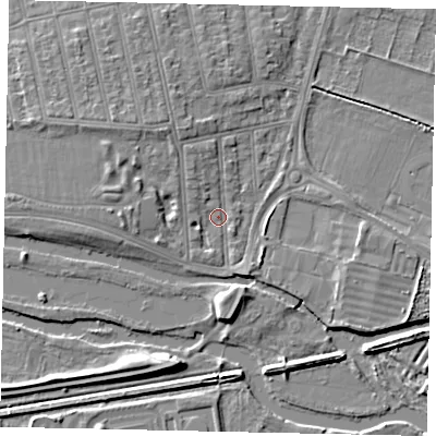 Shaded relief map of the ground around MK403UX, computed from Environment Agency LiDAR. The ground here sits at about 26 m above sea level and falls 5 m across the surrounding 800 m. Surface water reaching this point runs off ground lying to the north-west, 3.3 m higher.