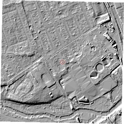 Shaded relief map of the ground around MK404JP, computed from Environment Agency LiDAR. The ground here sits at about 28 m above sea level and falls 7 m across the surrounding 800 m. Surface water reaching this point runs off ground lying to the west, 1.4 m higher.