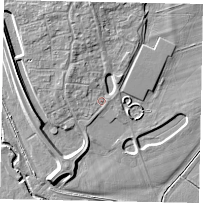 Shaded relief map of the ground around MK404SQ, computed from Environment Agency LiDAR. The ground here sits at about 29 m above sea level and falls 8 m across the surrounding 800 m. Surface water reaching this point runs off ground lying to the north-west, 4.4 m higher.