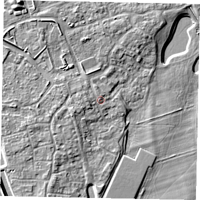 Shaded relief map of the ground around MK404SS, computed from Environment Agency LiDAR. The ground here sits at about 31 m above sea level and falls 10 m across the surrounding 800 m. Surface water reaching this point runs off ground lying to the west-north-west, 1.5 m higher.