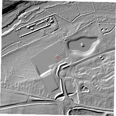 Shaded relief map of the ground around MK404WG, computed from Environment Agency LiDAR. The ground here sits at about 33 m above sea level and falls 16 m across the surrounding 800 m. Surface water reaching this point runs off ground lying to the south, 8.6 m higher.