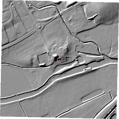 Shaded relief map of the ground around MK410HY, computed from Environment Agency LiDAR. The ground here sits at about 26 m above sea level and falls 16 m across the surrounding 800 m. Surface water reaching this point runs off ground lying to the north-west, 10.8 m higher.