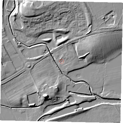 Shaded relief map of the ground around MK410HZ, computed from Environment Agency LiDAR. The ground here sits at about 23 m above sea level and falls 16 m across the surrounding 800 m. Surface water reaching this point runs off ground lying to the north-east, 1.6 m higher.
