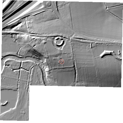 Shaded relief map of the ground around MK410JH, computed from Environment Agency LiDAR. The ground here sits at about 33 m above sea level and falls 19 m across the surrounding 800 m. Surface water reaching this point runs off ground lying to the north-north-east, 6.2 m higher.