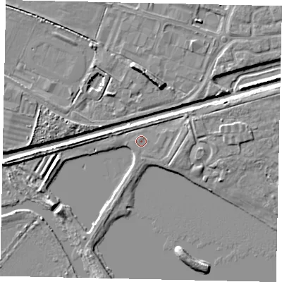 Shaded relief map of the ground around MK419DJ, computed from Environment Agency LiDAR. The ground here sits at about 25 m above sea level and falls 7 m across the surrounding 800 m. Surface water reaching this point runs off ground lying to the east-north-east, 1.7 m higher.