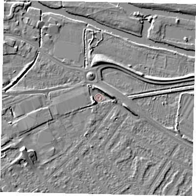 Shaded relief map of the ground around MK420EX, computed from Environment Agency LiDAR. The ground here sits at about 25 m above sea level and falls 7 m across the surrounding 800 m. Surface water reaching this point runs off ground lying to the south-west, 5.2 m higher.