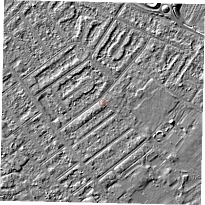 Shaded relief map of the ground around MK420HT, computed from Environment Agency LiDAR. The ground here sits at about 26 m above sea level and falls 3 m across the surrounding 800 m. Surface water reaching this point runs off ground lying to the west, 1.5 m higher.