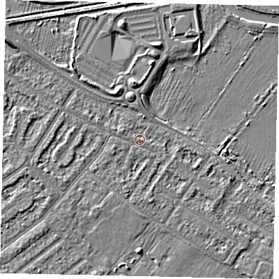 Shaded relief map of the ground around MK420JL, computed from Environment Agency LiDAR. The ground here sits at about 25 m above sea level and falls 6 m across the surrounding 800 m. Surface water reaching this point runs off ground lying to the west, 1.8 m higher.