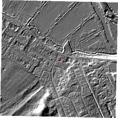 Shaded relief map of the ground around MK420LT, computed from Environment Agency LiDAR. The ground here sits at about 25 m above sea level and falls 7 m across the surrounding 800 m. Surface water reaching this point runs off ground lying to the south-east, 3.5 m higher.