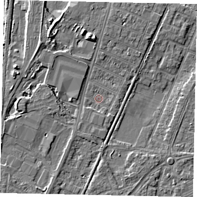 Shaded relief map of the ground around MK429PX, computed from Environment Agency LiDAR. The ground here sits at about 29 m above sea level and falls 9 m across the surrounding 800 m. Surface water reaching this point runs off ground lying to the south, 1.5 m higher.