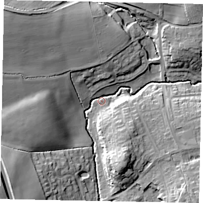 Shaded relief map of the ground around MK438NG, computed from Environment Agency LiDAR. The ground here sits at about 35 m above sea level and falls 24 m across the surrounding 800 m. Surface water reaching this point runs off ground lying to the north-west, 21.4 m higher.
