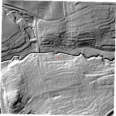 Shaded relief map of the ground around MK438PG, computed from Environment Agency LiDAR. The ground here sits at about 33 m above sea level and falls 21 m across the surrounding 800 m. Surface water reaching this point runs off ground lying to the south-south-west, 6.8 m higher.