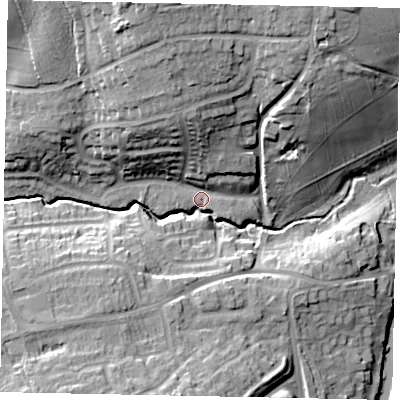 Shaded relief map of the ground around MK438PL, computed from Environment Agency LiDAR. The ground here sits at about 33 m above sea level and falls 25 m across the surrounding 800 m. Surface water reaching this point runs off ground lying to the north-north-west, 21.7 m higher.