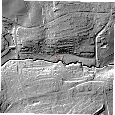 Shaded relief map of the ground around MK438PP, computed from Environment Agency LiDAR. The ground here sits at about 33 m above sea level and falls 23 m across the surrounding 800 m. Surface water reaching this point runs off ground lying to the north-north-east, 12.7 m higher.