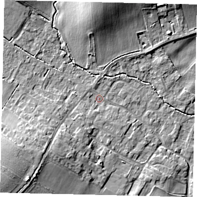 Shaded relief map of the ground around MK443LE, computed from Environment Agency LiDAR. The ground here sits at about 22 m above sea level and falls 14 m across the surrounding 800 m. Surface water reaching this point runs off ground lying to the south-west, 11.7 m higher.