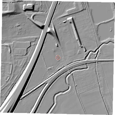 Shaded relief map of the ground around MK443LW, computed from Environment Agency LiDAR. The ground here sits at about 23 m above sea level and falls 12 m across the surrounding 800 m. Surface water reaching this point runs off ground lying to the south-west, 8.7 m higher.