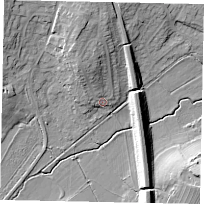 Shaded relief map of the ground around MK451JF, computed from Environment Agency LiDAR. The ground here sits at about 69 m above sea level and falls 20 m across the surrounding 800 m. Surface water reaching this point runs off ground lying to the north-north-west, 12.0 m higher.