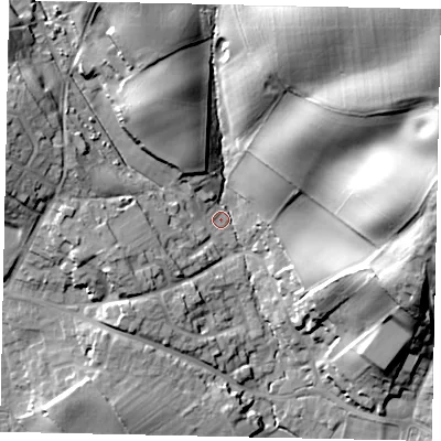 Shaded relief map of the ground around MK452DE, computed from Environment Agency LiDAR. The ground here sits at about 74 m above sea level and falls 35 m across the surrounding 800 m. Surface water reaching this point runs off ground lying to the north-east, 29.9 m higher.