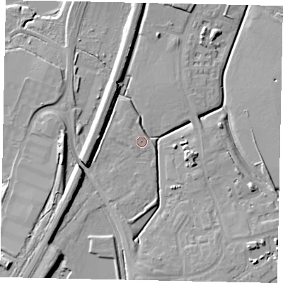 Shaded relief map of the ground around MK453FU, computed from Environment Agency LiDAR. The ground here sits at about 35 m above sea level and falls 14 m across the surrounding 800 m. Surface water reaching this point runs off ground lying to the south-east, 7.4 m higher.