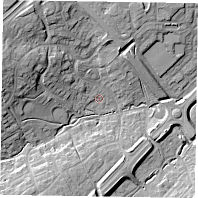 Shaded relief map of the ground around MK57EL, computed from Environment Agency LiDAR. The ground here sits at about 89 m above sea level and falls 24 m across the surrounding 800 m. Surface water reaching this point runs off ground lying to the north-west, 12.7 m higher.
