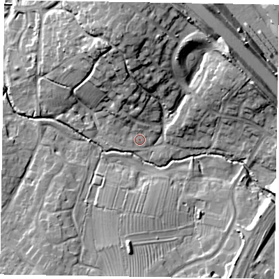 Shaded relief map of the ground around MK58AZ, computed from Environment Agency LiDAR. The ground here sits at about 73 m above sea level and falls 20 m across the surrounding 800 m. Surface water reaching this point runs off ground lying to the north-north-east, 2.5 m higher.