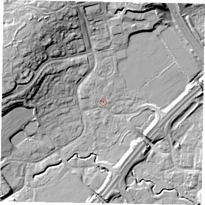 Shaded relief map of the ground around MK77BG, computed from Environment Agency LiDAR. The ground here sits at about 70 m above sea level and falls 20 m across the surrounding 800 m. Surface water reaching this point runs off ground lying to the north-north-west, 13.6 m higher.