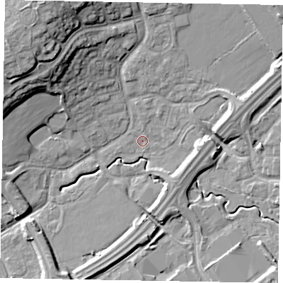 Shaded relief map of the ground around MK77BL, computed from Environment Agency LiDAR. The ground here sits at about 68 m above sea level and falls 20 m across the surrounding 800 m. Surface water reaching this point runs off ground lying to the east-north-east, 6.7 m higher.