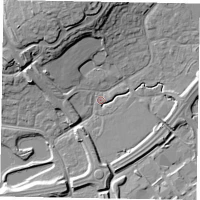 Shaded relief map of the ground around MK77ED, computed from Environment Agency LiDAR. The ground here sits at about 68 m above sea level and falls 20 m across the surrounding 800 m. Surface water reaching this point runs off ground lying to the north, 13.6 m higher.