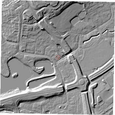 Shaded relief map of the ground around MK77HX, computed from Environment Agency LiDAR. The ground here sits at about 67 m above sea level and falls 17 m across the surrounding 800 m. Surface water reaching this point runs off ground lying to the north, 13.6 m higher.
