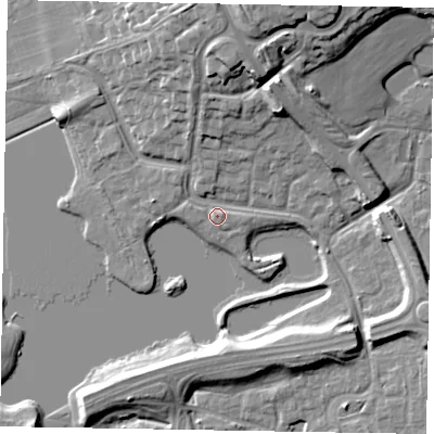 Shaded relief map of the ground around MK77JH, computed from Environment Agency LiDAR. The ground here sits at about 67 m above sea level and falls 17 m across the surrounding 800 m. Surface water reaching this point runs off ground lying to the north-north-east, 15.6 m higher.