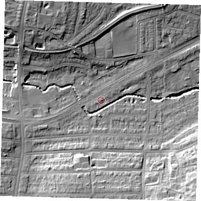 Shaded relief map of the ground around N136BJ, computed from Environment Agency LiDAR. The ground here sits at about 24 m above sea level and falls 19 m across the surrounding 800 m. Surface water reaching this point runs off ground lying to the north-west, 14.6 m higher.