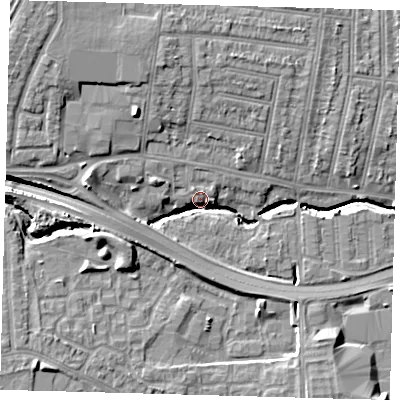 Shaded relief map of the ground around N181QS, computed from Environment Agency LiDAR. The ground here sits at about 18 m above sea level and falls 12 m across the surrounding 800 m. Surface water reaching this point runs off ground lying to the north-west, 10.6 m higher.