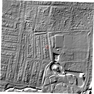 Shaded relief map of the ground around N181RZ, computed from Environment Agency LiDAR. The ground here sits at about 18 m above sea level and falls 10 m across the surrounding 800 m. Surface water reaching this point runs off ground lying to the north-north-east, 2.4 m higher.