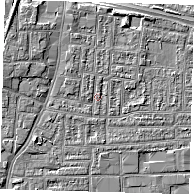Shaded relief map of the ground around N182AJ, computed from Environment Agency LiDAR. The ground here sits at about 12 m above sea level and falls 8 m across the surrounding 800 m. Surface water reaching this point runs off ground lying to the north-west, 1.9 m higher.