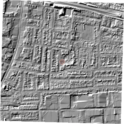 Shaded relief map of the ground around N182AP, computed from Environment Agency LiDAR. The ground here sits at about 12 m above sea level and falls 6 m across the surrounding 800 m. Surface water reaching this point runs off ground lying to the north-north-west, 1.7 m higher.