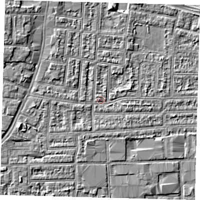 Shaded relief map of the ground around N182BL, computed from Environment Agency LiDAR. The ground here sits at about 12 m above sea level and falls 6 m across the surrounding 800 m. Surface water reaching this point runs off ground lying to the north-north-west, 3.1 m higher.
