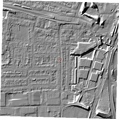 Shaded relief map of the ground around N182DQ, computed from Environment Agency LiDAR. The ground here sits at about 11 m above sea level and falls 9 m across the surrounding 800 m. Surface water reaching this point runs off ground lying to the north-west, 3.7 m higher.