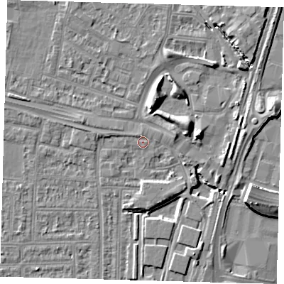 Shaded relief map of the ground around N182DT, computed from Environment Agency LiDAR. The ground here sits at about 11 m above sea level and falls 9 m across the surrounding 800 m. Surface water reaching this point runs off ground lying to the north, 1.2 m higher.