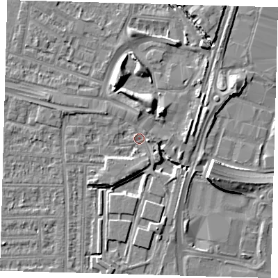Shaded relief map of the ground around N182DX, computed from Environment Agency LiDAR. The ground here sits at about 11 m above sea level and falls 9 m across the surrounding 800 m. Surface water reaching this point runs off ground lying to the north, 4.4 m higher.