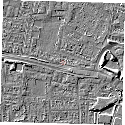 Shaded relief map of the ground around N182ED, computed from Environment Agency LiDAR. The ground here sits at about 12 m above sea level and falls 8 m across the surrounding 800 m. Surface water reaching this point runs off ground lying to the west, 1.6 m higher.