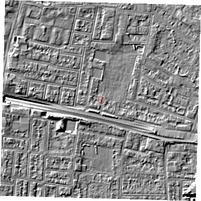 Shaded relief map of the ground around N182EG, computed from Environment Agency LiDAR. The ground here sits at about 12 m above sea level and falls 9 m across the surrounding 800 m. Surface water reaching this point runs off ground lying to the west-north-west, 1.0 m higher.