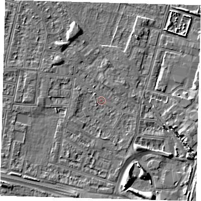 Shaded relief map of the ground around N182EZ, computed from Environment Agency LiDAR. The ground here sits at about 11 m above sea level and falls 7 m across the surrounding 800 m. Surface water reaching this point runs off ground lying to the south-west, 1.4 m higher.