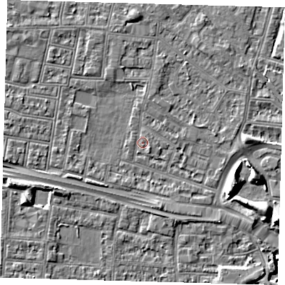 Shaded relief map of the ground around N182HQ, computed from Environment Agency LiDAR. The ground here sits at about 12 m above sea level and falls 8 m across the surrounding 800 m. Surface water reaching this point runs off ground lying to the south-east, 0.8 m higher.